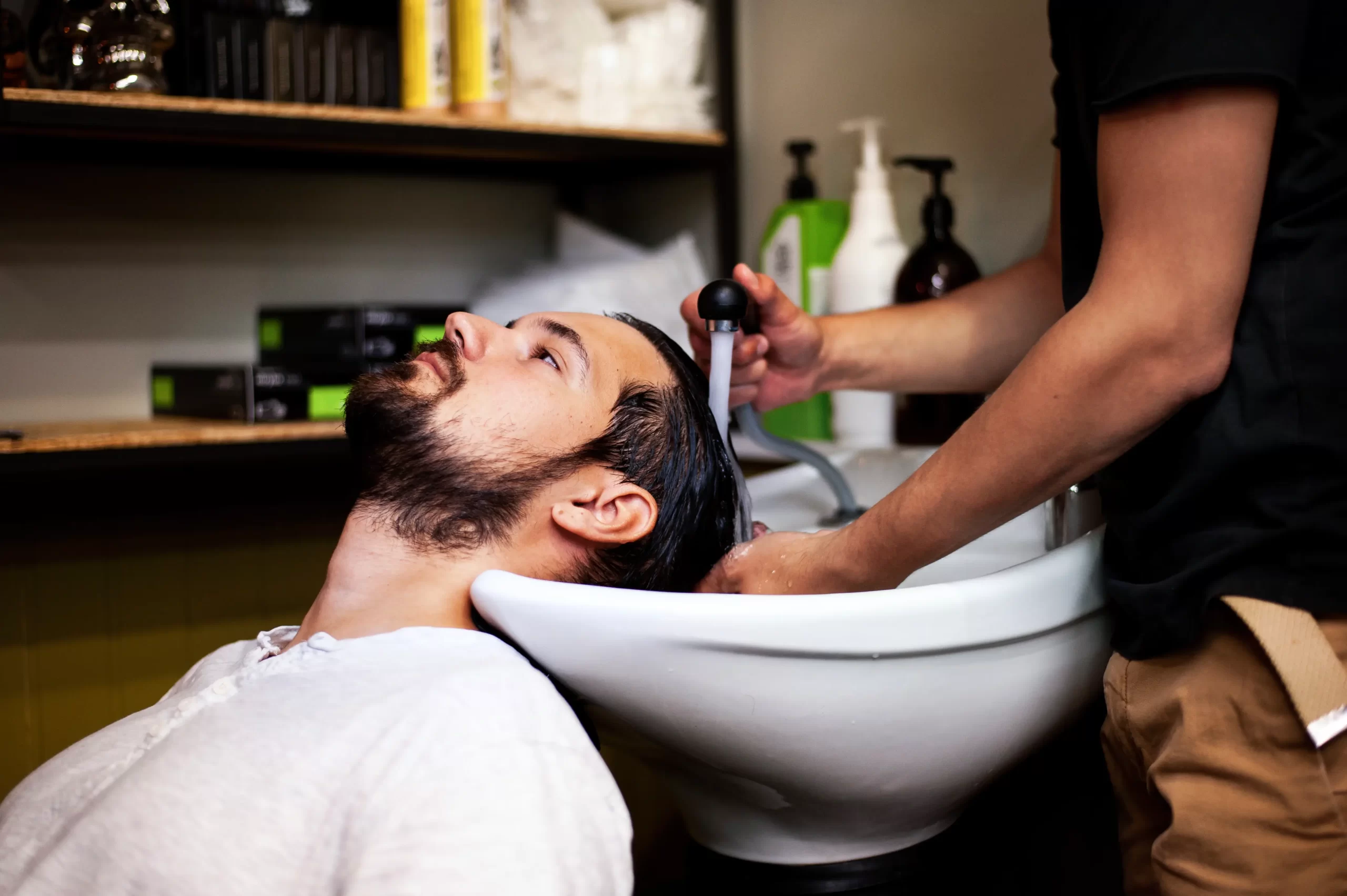 customer-getting-wash-after-haircut