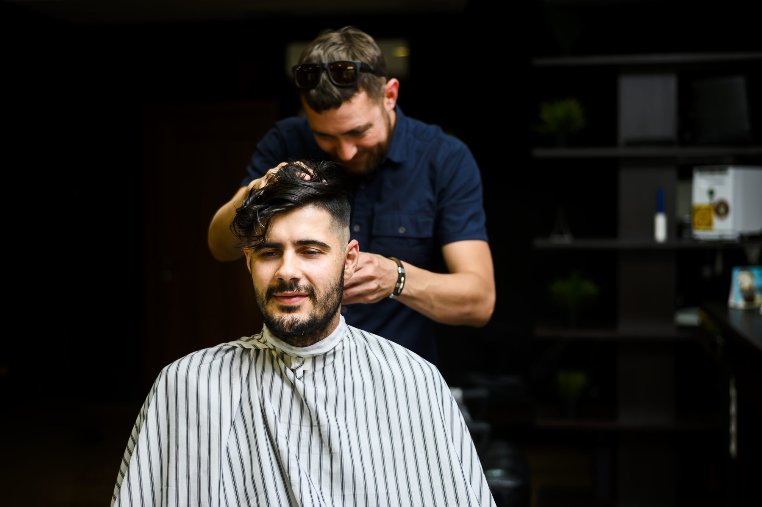 medium-shot-hairstylist-cutting-client-s-hair