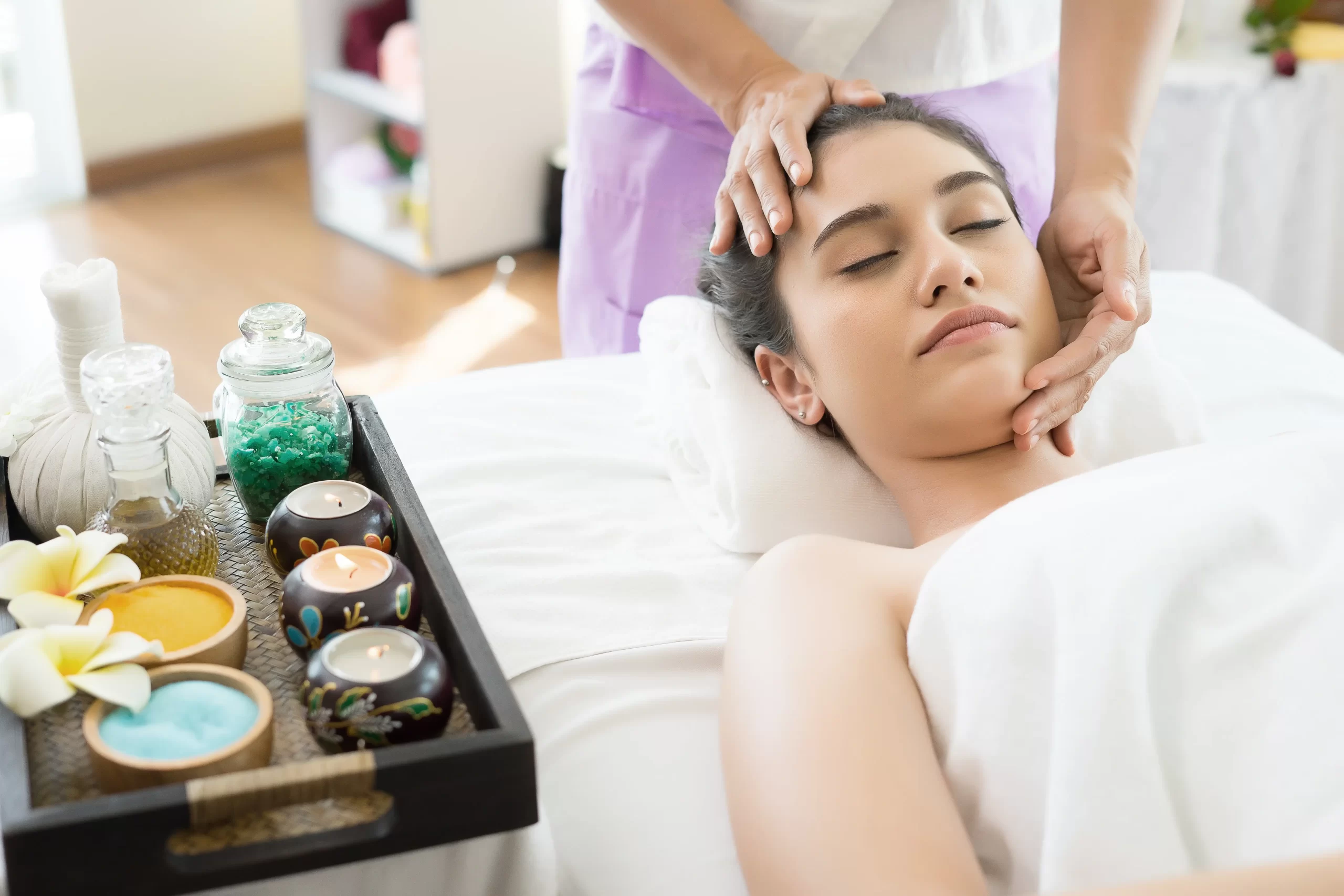 young-beautiful-woman-having-face-massage-relaxing-spa